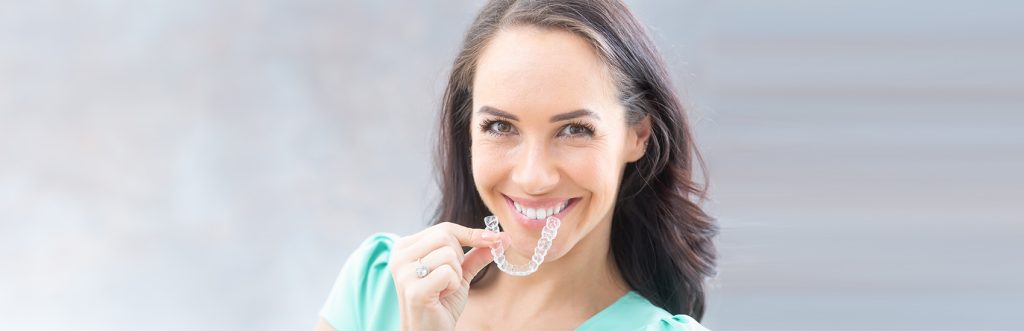 Woman deciding Invisalign is right for her new smile